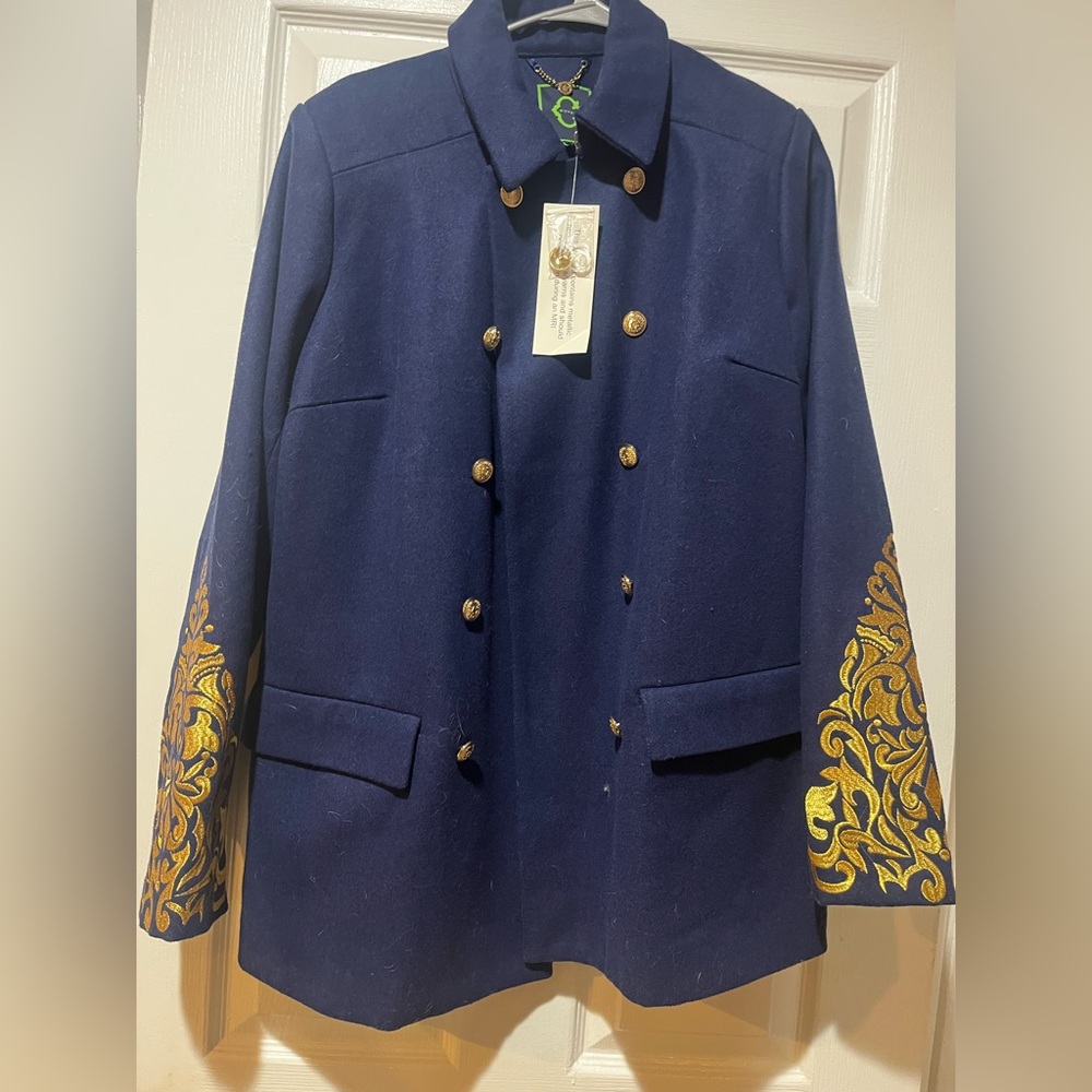 C. Wonder Dark Blue coat with gold Highlights